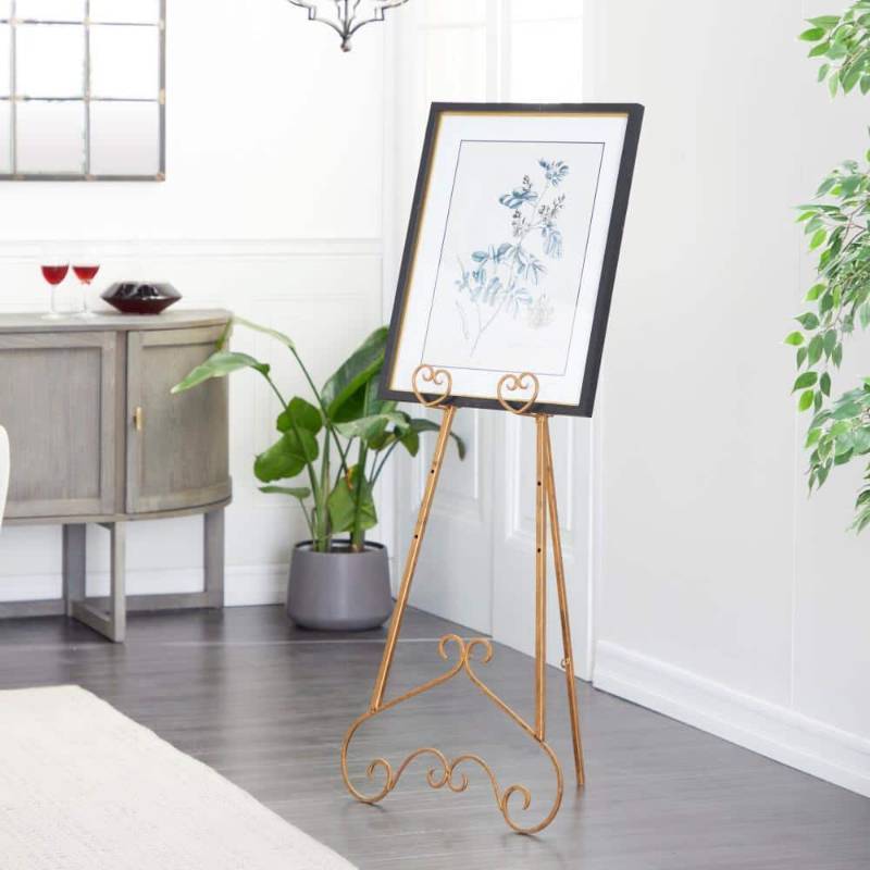 lot 21986 image: DecMode Traditional Gold Metal Easel with Scroll Heart Details  23 W x 48 H - Retail $63 - SEE DETAILS