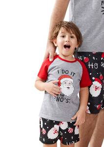 lot 9034 image: Christmas Pajamas  Short Sleeve  Santa Print Top and Black Santa Shorts Sleepwear  Kids 3-4 Years SINGLE