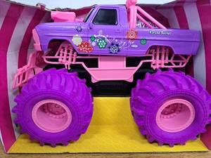 lot 4029 image: Flooyes Remote Control Car, Pink RC Cars, 2.4GHz All Terrain Off-Road Monster Trucks, 2 Rechargeable Batteries (Damage to Exterior)