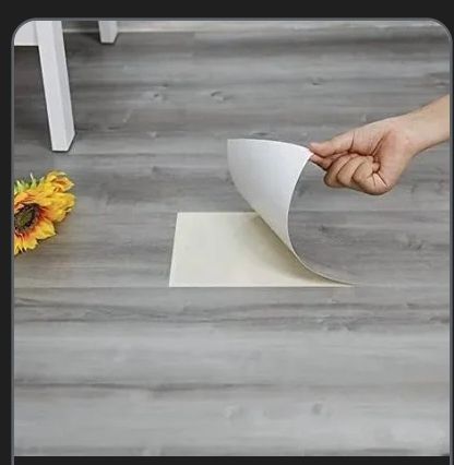 lot 16432 image: Peel and Stick Flooring Grar Tile (10 Pieces)