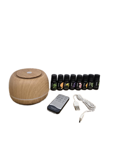 lot 997 image: Essential Oil Diffuser Set with Remote Control, 8 Essentials Oils, and Remote Control, WORKS