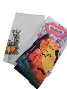 lot 9539 image: Halloween Bundle Set, Ghost Towel, Ghost Light-Up Flag, and Vampire Fangs Decor