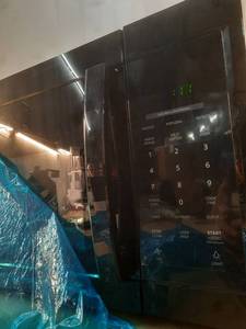 lot 15096 image: 1.7 cu. ft. 1000-Watt Over the Range Microwave in Black - Retail $179