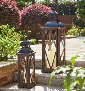 lot 2956 image: Glitzhome 2 Pack Farmhouse WoodMetal Decorative Candle Lanterns Vintage Hanging Lantern for Patio - Tabletop, Black (No Glass) (damage on large lantern) - Retail $0