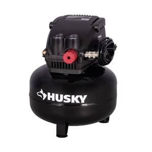 lot 5546 image: Husky 3 Gal. 120 PSI Portable Electric Oil-Free Light Duty Pancake Air Compressor with Fold Down Handle and 1-Quick Coupler - Retail $69