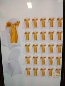 lot 5572 image: Folding Chair Covers White with Golden Chair Sashes Bows 50 Each - Retail $73