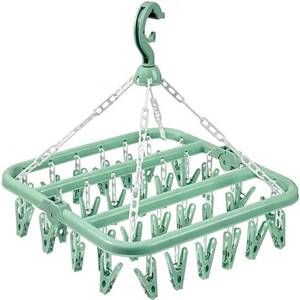 lot 29256 image: alladaga Clothes Drying Hanger with 32 Clips and Drip Foldable Hanging Rack (Light Green) - Retail $10