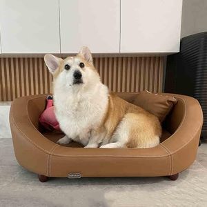 lot 1074 image: Pet Sofa, faux Leather Surface dark brown white contrast stitching, Solid Wood Frame Dog Bedcat Bed, (Brown,24w x 16d x 7h in front12 in back) with feet - Retail $90