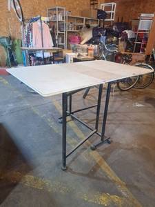 lot 600 image: Folding Craft Table with Wheels