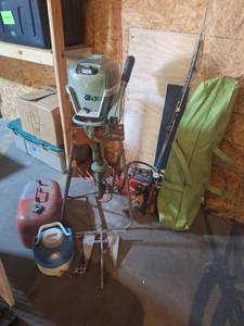 lot 604 image: Johnson Sea Horse 5.5 HP Outboard Motor with Gas Tank, Poles, Gas Tanks, Anchor, Tent, Reels