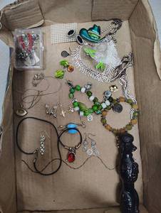lot 429 image: Assortment of Jewelry and Black Poodle Avon Decanter