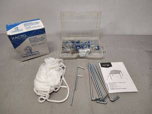 lot 434 image: Hardware for Pop Up Canopy Tent Canopy Not Included Assortment of Nails in Storage Container and Large Box of Bulldog Clips
