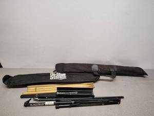 lot 499 image: 2 Drum Stands with Drum Sticks and Carry Bag