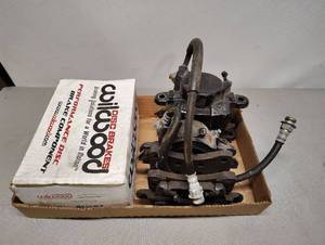 lot 513 image: Brake Caliper and Box of Hardware
