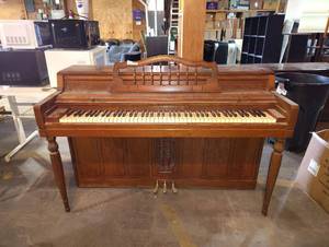 lot 520 image: Piano with Wheels