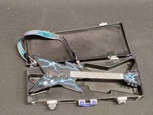 lot 30 image: Rainbow High, Uma Vanhoose Doll Accessory, Miniature Replica of a Dean Razorback Model.
