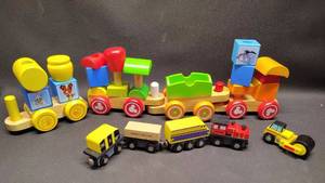 lot 52 image: Wood Mickey Mouse Toy Train and Magnetic Wood Toy Train