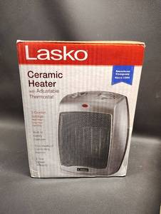 lot 77 image: NIB Lasko Ceramic Space Heater with Adjustable Thermostat