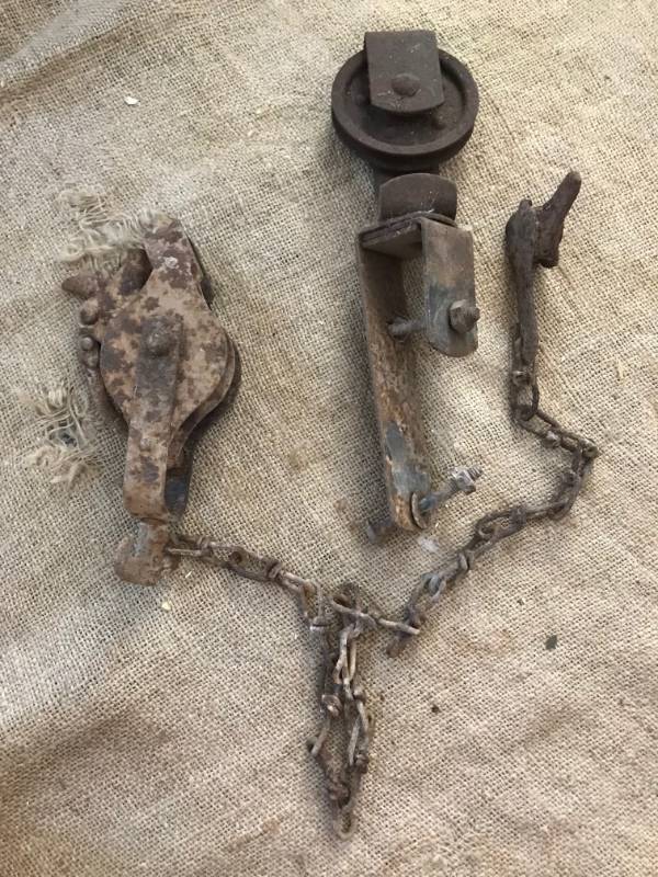 lot 74 image: Rustic Vintage pulleys and chain