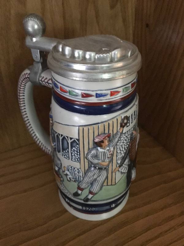 lot 114 image: Collectible Vintage Avon Sporting Stein Decanter (baseball theme)--good condition.   Numbered #196124