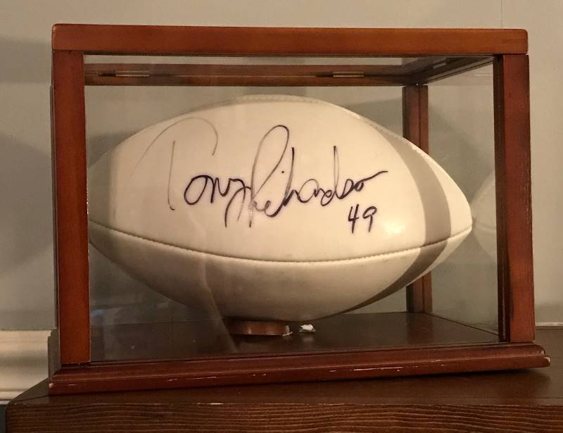 lot 140 image: Autographed Wilson NFL Football in Case.   Tony Richardson #49 Kansas City Chiefs