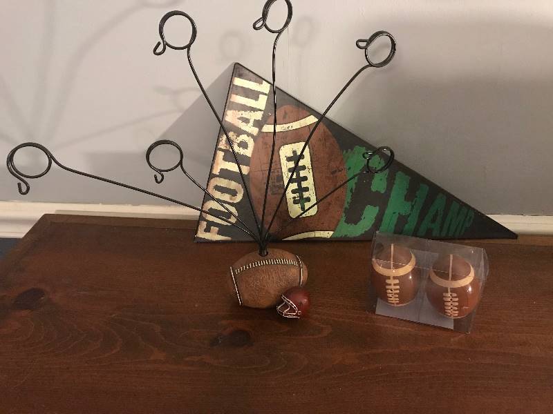 lot 185 image: Football items--Metal Wall Pennant, Salt and Pepper Shakers and Card Holder