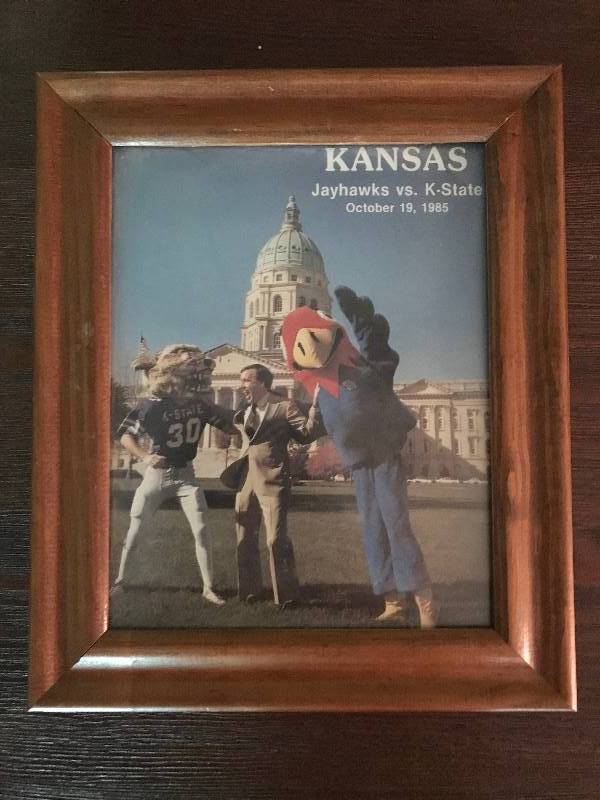 lot 196 image: Framed KU Jayhawks vs K State Wildcats 1985