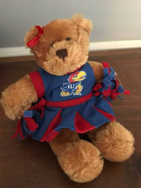 lot 201 image: Musical Teddy Bear dressed at Kansas University (KU) Jayhawk Cheerleader