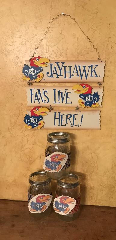 lot 202 image: Kansas University Jayhawks Wood Wall Plank Dcor and decorated Mason Jars
