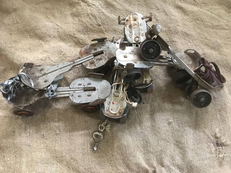 lot 214 image: Set of 3 rustic metal strap on skates