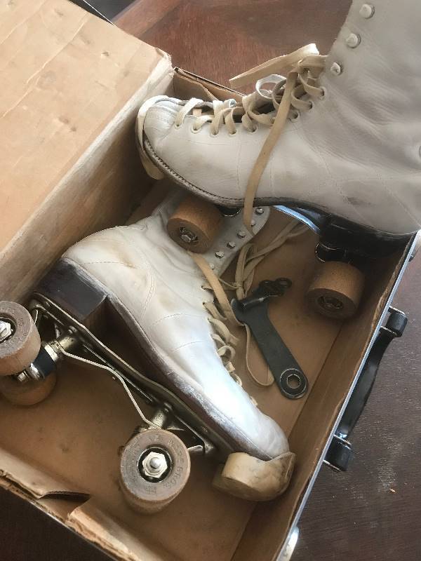 lot 220 image: Vintage Skates (made by Chicago Co.) from Saindom Roller Rink in Hays, KS.     Men Size 8