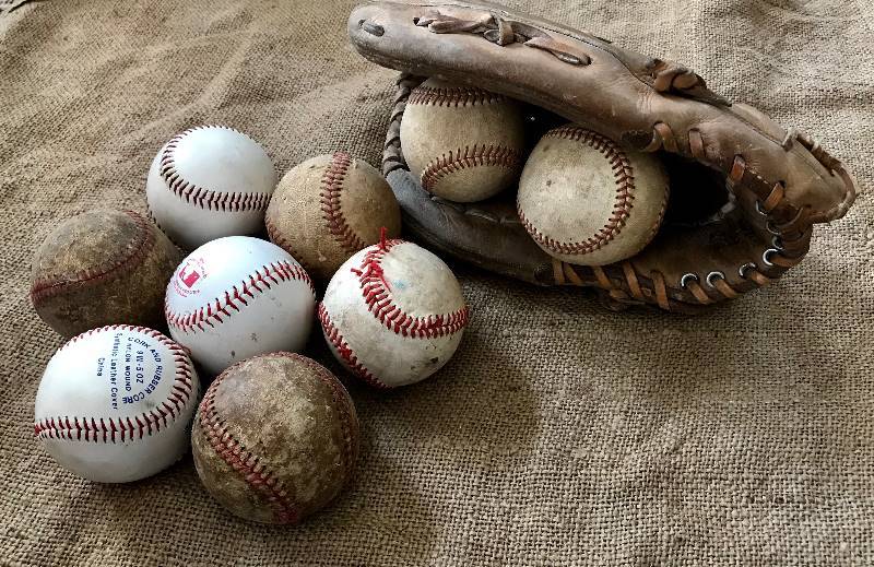 lot 229 image: Baseballs and Baseball Glove