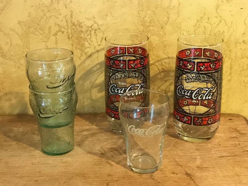 lot 2018 image: Variety of collector Coca Cola glasses