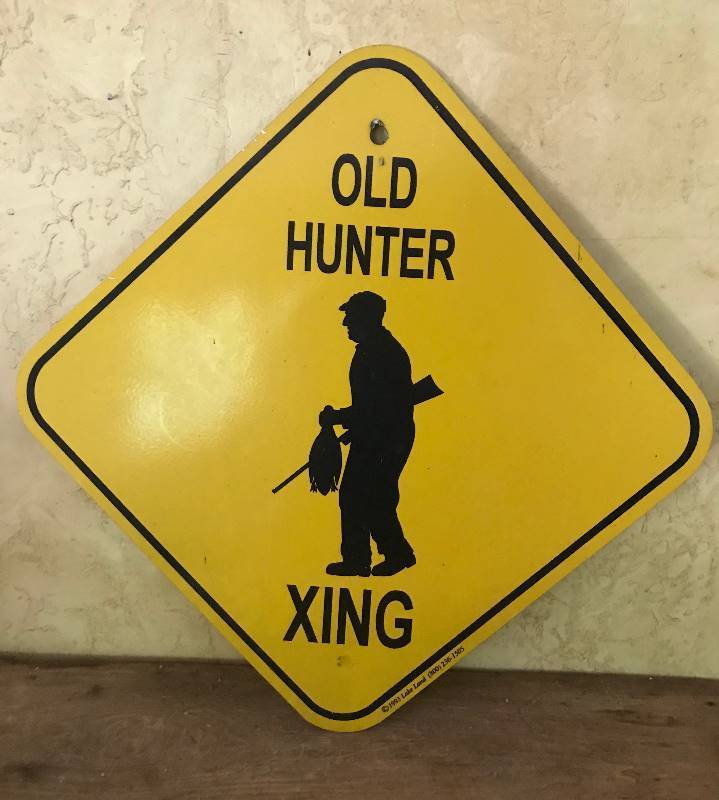 lot 2031 image: Old Hunter Crossing Yellow Metal sign