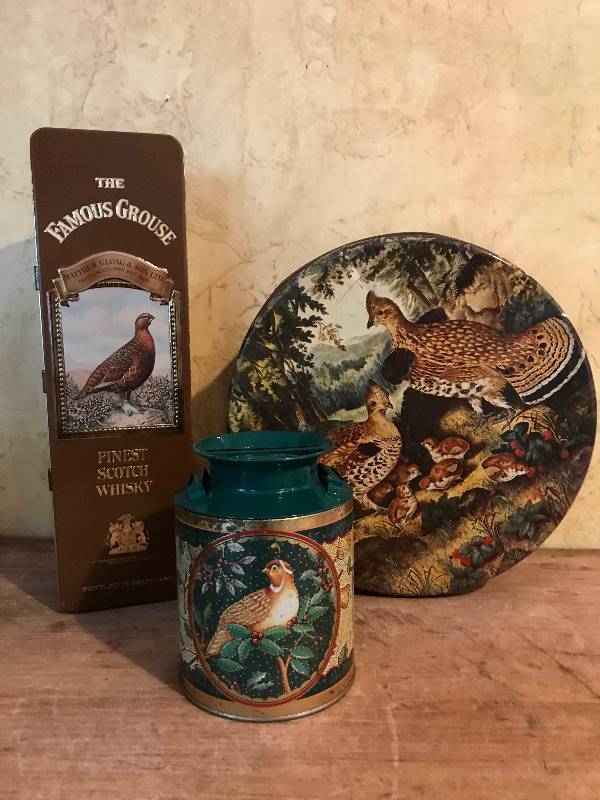 lot 2044 image: Set of Tins (Vintage round tin, and Famous Grouse Scotch Whisky)