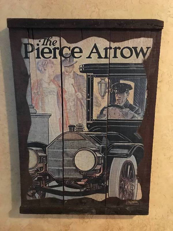 lot 2086 image: Vintage Wood Pallet with Pierce Arrow Ad Poster