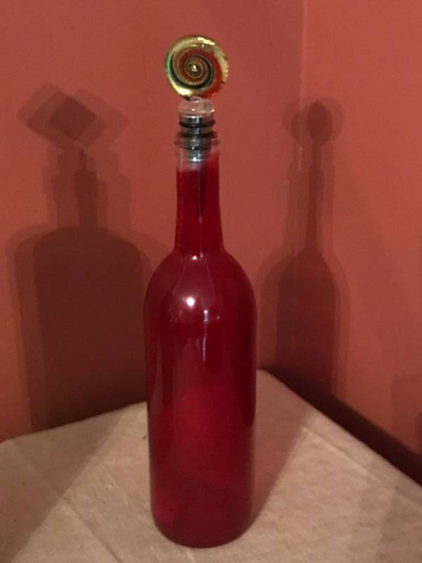 lot 2110 image: Glass Wine Bottle Stopper and red bottle
