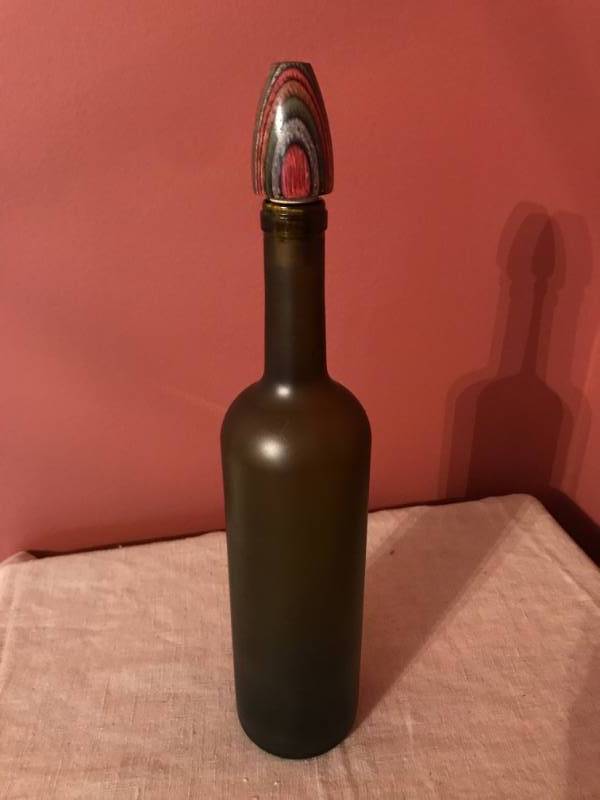 lot 2111 image: Colorful Wood Wine Bottle Stopper and  bottle