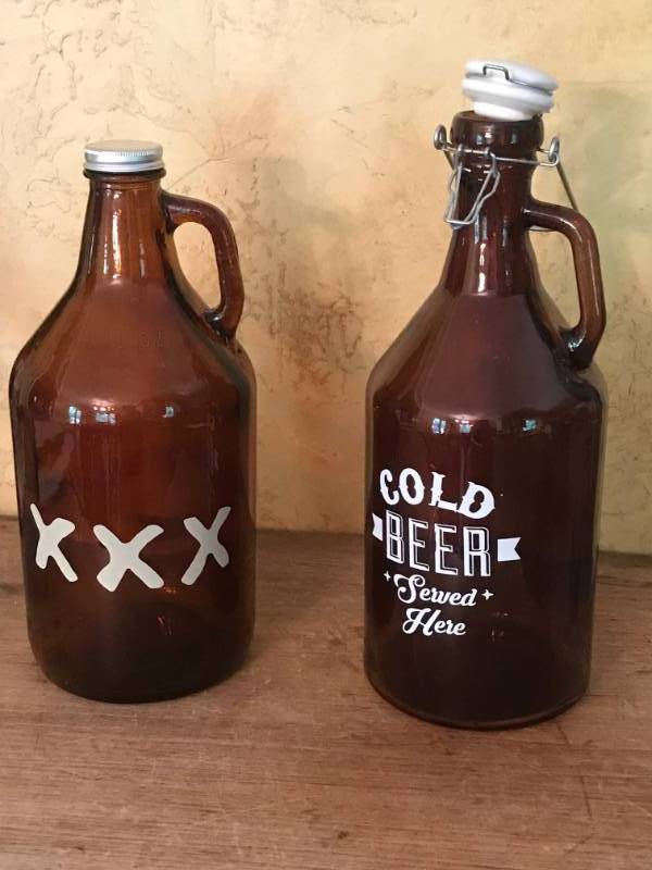 lot 2124 image: Set of 2 large beer bottlesCold Beer Served Here--one with a flip top (bail closure)