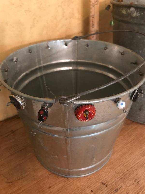 lot 2138 image: 9 Galvanized Bucket decorated with bottle caps