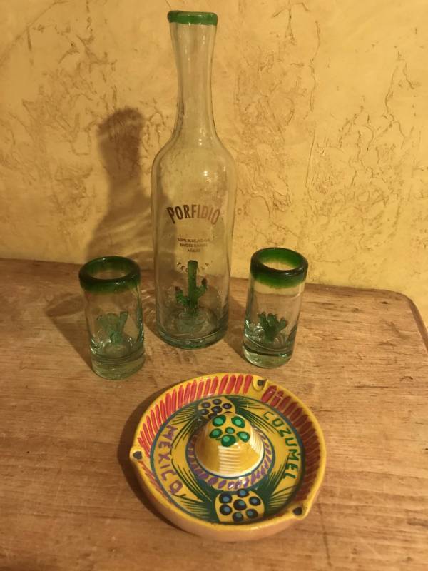 lot 2217 image: Tequila Bottle and shot glasses and ceramic Sombrero ashtray