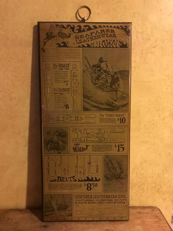 lot 2231 image: Seafarer Leatherwear--The Whaler Vintage Wall Art on Wood 12 12 x 27 12
