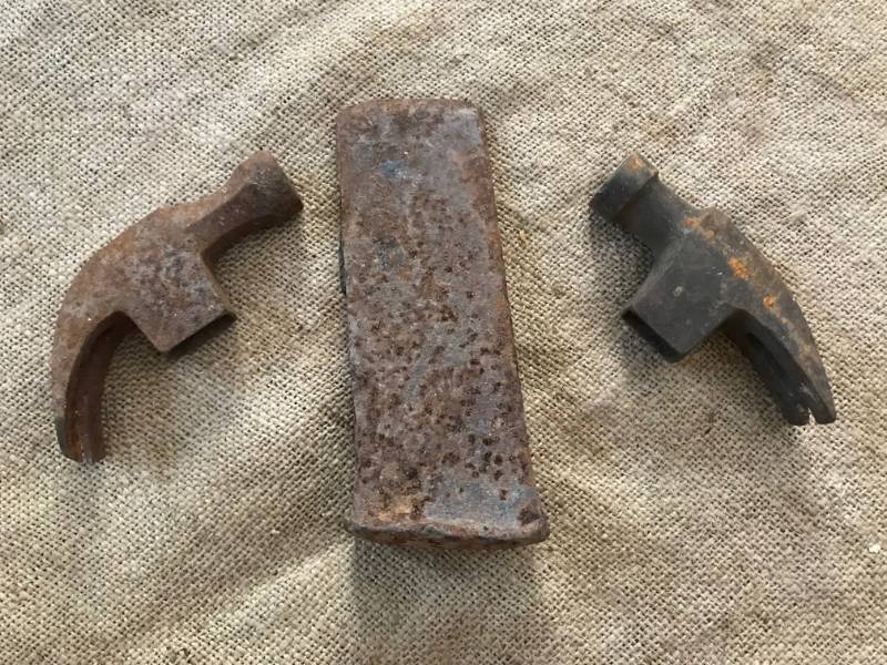 lot 2255 image: Set of rustic tool heads (ax and hammer heads)