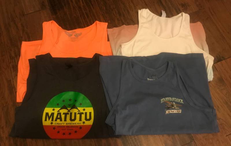lot 2285 image: Set of 4 Medium Tank Tops
