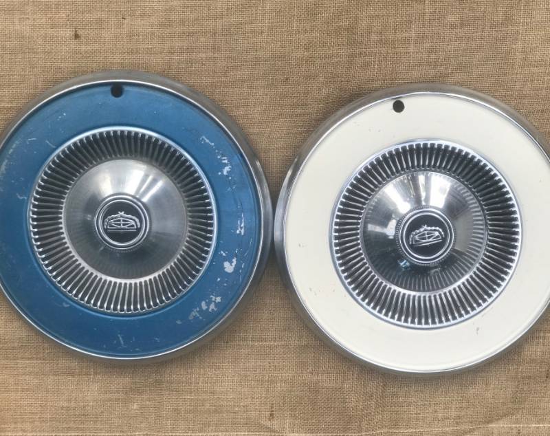 lot 38 image: Set of 2 vintage ford hubcaps--maybe either for Gran Torino or Maverick