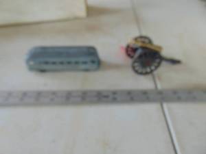 lot 2132 image: Greyhound bus toy and Small Cannon