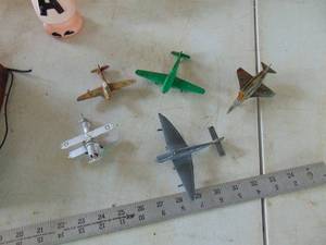 lot 2137 image: Selection of MetalDiecast planes - one made from a sparkplug