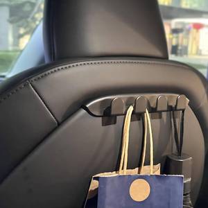 lot 24063 image: COSLAKE 2PCS for Tesla Seat Hooks, for Tesla Model 3 Y Accessories 2025 2024 2023 2022 2021 2020 2019 2018 2017 for Model 3 Headrest Organizer Hooks Model Y Purses Hanger