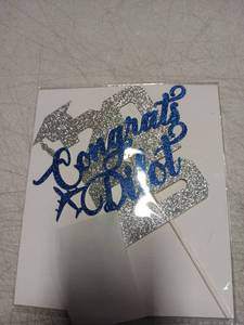 lot 39563 image: Silver and Blue Glitter Congrats Pilot Cake Topper