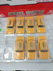 lot 18305 image: Model World Die Cast Cars 132 Scale Taxi Cab - 7 Pcs